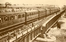 A Train Passing Over The Bridge c1930. Creator: Unknown