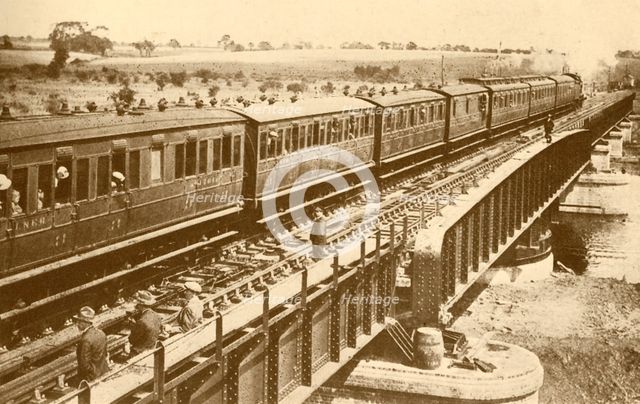 'A Train Passing Over The Bridge', c1930. Creator: Unknown.