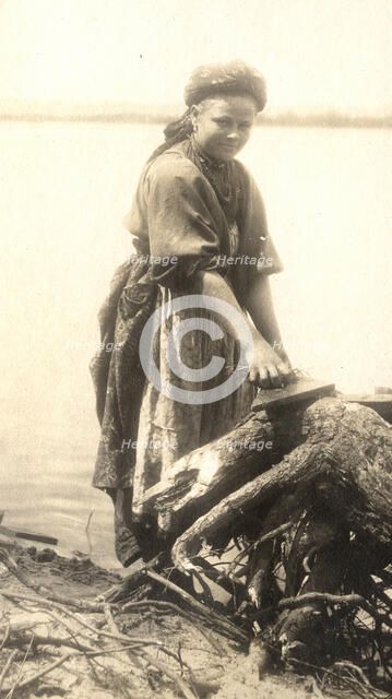 A Transbaikal migrant at work on the banks of the Zeya River, 1909. Creator: Vladimir Ivanovich Fedorov.