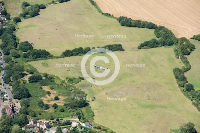 A two seat Spitfire in flight near Goodwood Aerodrome, West Sussex, 2020. Creator: Damian Grady.