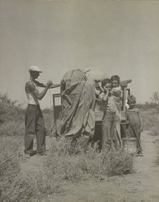 A tubercular painter from Iowa and part of his family... penniless in New Mexico, 1937. Creator: Dorothea Lange