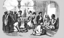 A Turkish Court of Justice; The Bastinado 1854. Creator: Unknown
