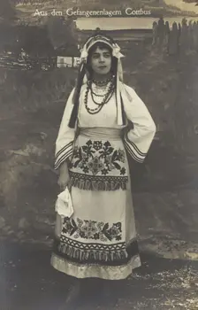 A Ukrainian prisoner of war performing a dance at a prisoner... (between 1910 and 1919?). Creator: Paul Tharan