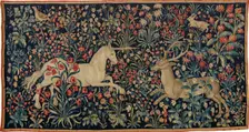 A unicorn and a stag in a field of flowers , c. 1500. Creator: Anonymous master