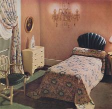 A Vantona Court bedcover gives a luxurious note to this bedroom 1942