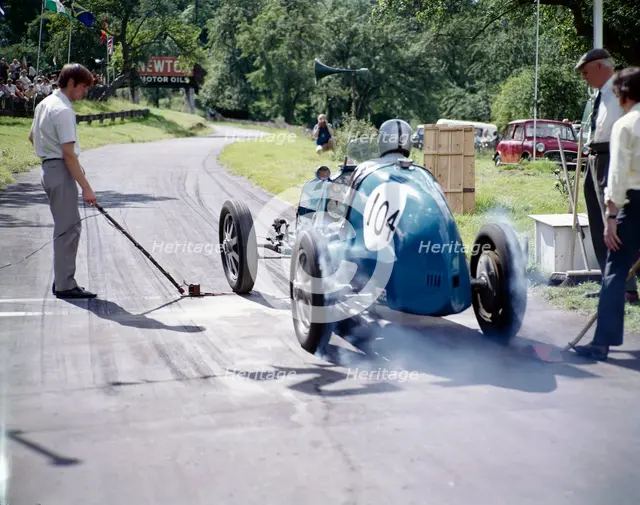 A vintage car at Prescott race track, Gloucestershire. Artist: Unknown