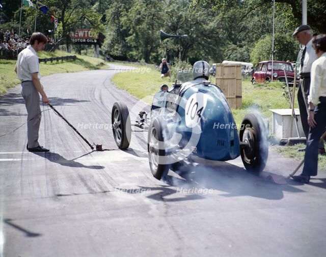 A vintage car at Prescott race track, Gloucestershire. Artist: Unknown