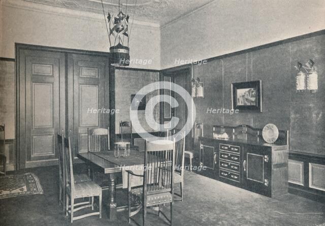 'A view of a dining-room in a Berlin flat, designed by M. H. Baillie Scott', c1909. Creator: Unknown.