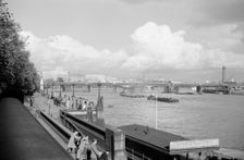 A view of Hungerford Bridge and River Thames, Lambeth, London, c1945-1965. Artist: SW Rawlings