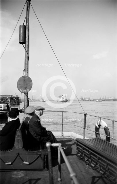 A view of shipping near Gravesend, Kent, from the stern of a passenger ferry, c1945-c1965. Artist: SW Rawlings