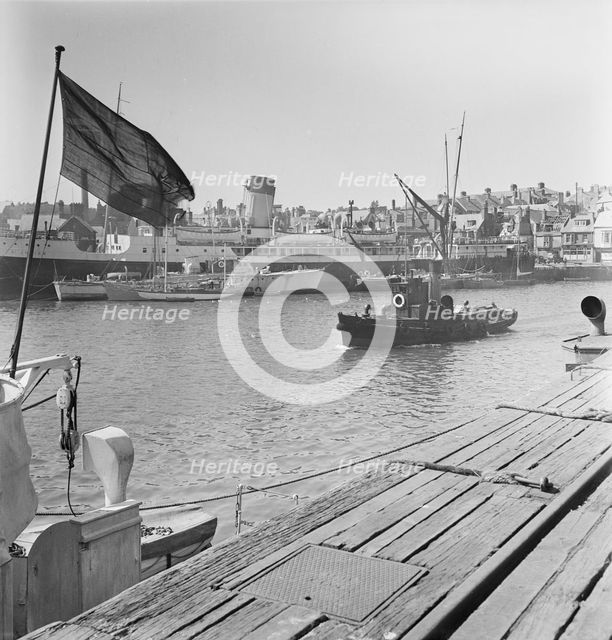 A view of the harbour at Weymouth showing various vessels including SS St Julien, 1948. Creator: John Laing plc.