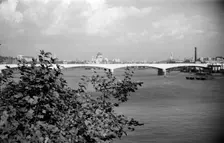 A view eastwards along the River Thames to Waterloo Bridge and the City of London, c1945-c1965 Artist: SW Rawlings