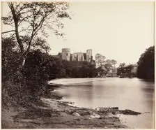 A view looking along the River Tees towards the ruins of Barnard Castle, 1860s. Creator: James Mudd