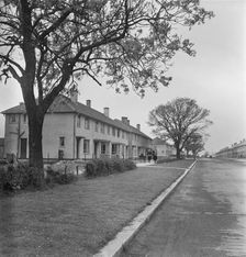 A view looking down a street of Easiform housing in Grimsby, Loncolnshire, 1948. Creator: John Laing plc