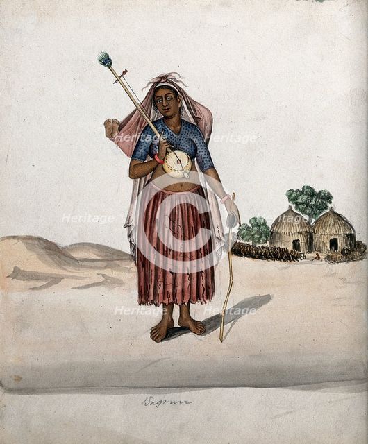 A village woman carrying a musical instrument in one hand, a stick with..., (between 1800 and 1899?) Creator: Unknown.