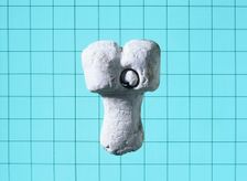 A votive offering of the male genitalia. Creator: Unknown