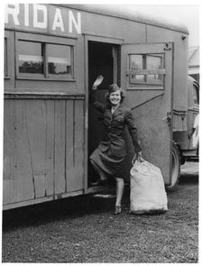 A WAAC boarding a bus, Fort Sheridan, Illinois, USA, 1940