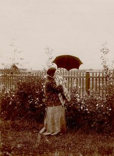 A walk in the garden at the Yudins dacha in Tarakanovo, 1903. Creator: Unknown