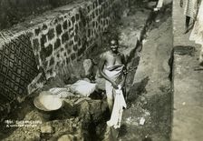 A washerwoman, Sierra Leone, 20th century