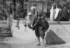 A water carrier in Damascus, Syria, c1920s-c1930s(?)