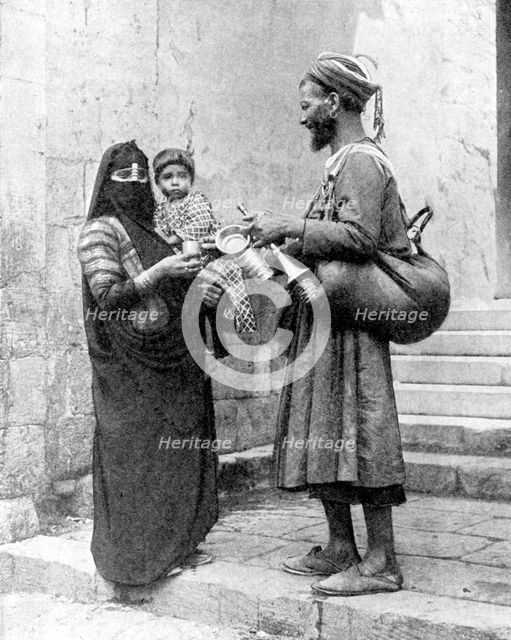 A water seller, Cairo, Egypt, 1936.Artist: Donald McLeish