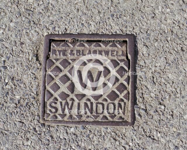 A water stop tap cover plate made by Rye and Blackwell, Swindon, Wiltshire, 2006. Artist: Peter Williams.