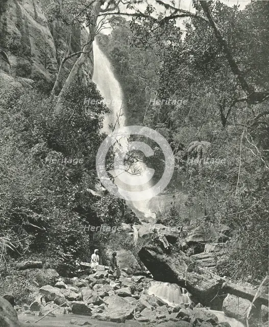 A waterfall near the village, Nuwara Eliya, Ceylon, 1895. Creator: W & S Ltd.