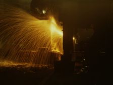 A welder who works in the round-house at the Chicago and Northwestern Railroad's Proviso yard, 1942. Creator: Jack Delano