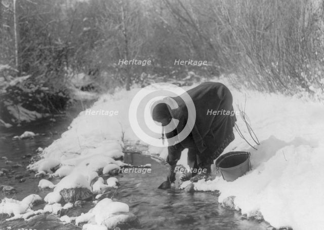 A winter day-Apsaroke, c1908. Creator: Edward Sheriff Curtis.