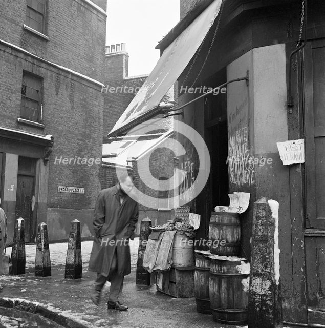 A winter's day in Frostic Place, Stepney, London, c1946-c1959. Artist: John Gay