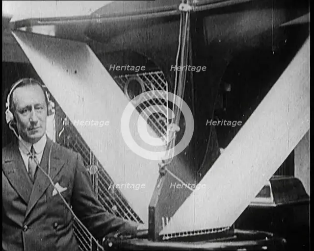 A Wireless Radio Aerial Spinning as Guglielmo Marconi Attempts to Receive a Signal, 1922. Creator: British Pathe Ltd.