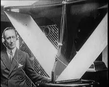 A Wireless Radio Aerial Spinning as Guglielmo Marconi Attempts to Receive a Signal, 1922. Creator: British Pathe Ltd
