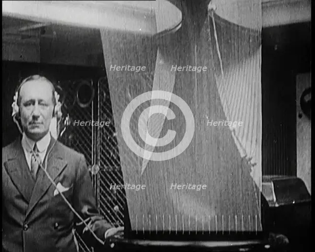 A Wireless Radio Aerial Spinning as Guglielmo Marconi Attempts to Receive a Signal, 1922. Creator: British Pathe Ltd.