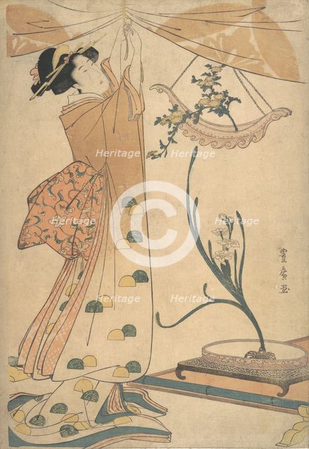 A Woman Tying up a Curtain, a Flower Arrangement of Chrysanthemums in a Boat-shaped Ha..., ca. 1805. Creator: Utagawa Toyohiro.