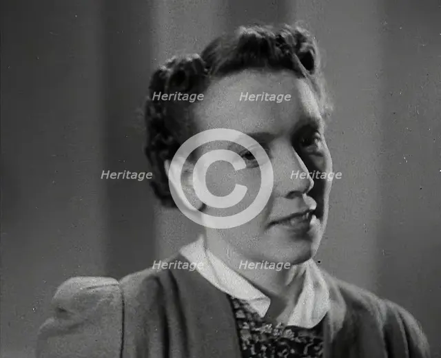 A Woman With Her Hair Cut in the 'Victory' Style, 1942. Creator: British Pathe Ltd.