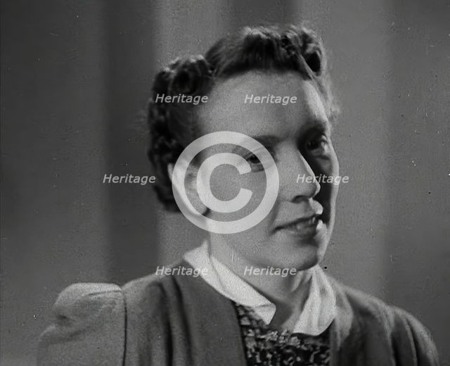 A Woman With Her Hair Cut in the 'Victory' Style, 1942. Creator: British Pathe Ltd.