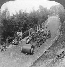 A woman work team on the Darjeeling highway, India, 1903.Artist: Underwood & Underwood