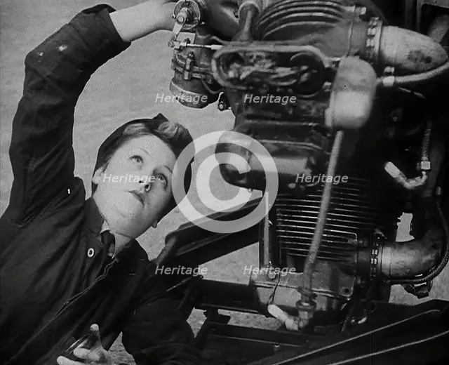 A Woman Working on an Aeroplane Engine, 1942. Creator: British Pathe Ltd.