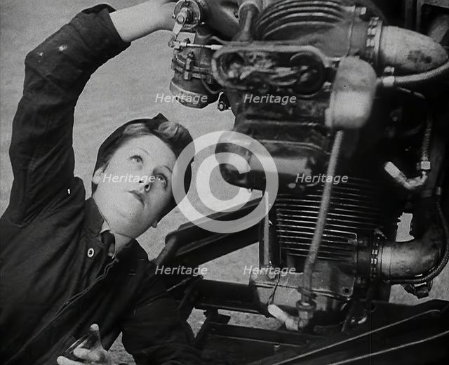 A Woman Working on an Aeroplane Engine, 1942. Creator: British Pathe Ltd.