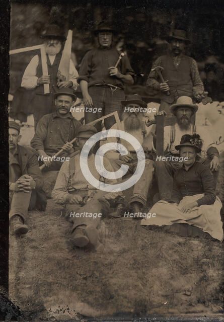 A Woman and Eight Carpenters Posed Outdoors, 1880s. Creator: Unknown.