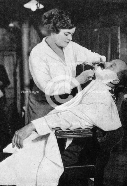 A woman barber, 1917 (1936). Artist: Unknown