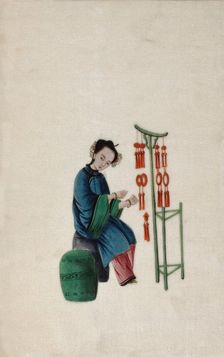 A woman displaying good luck tassels for sale, 1800. Creator: Unknown