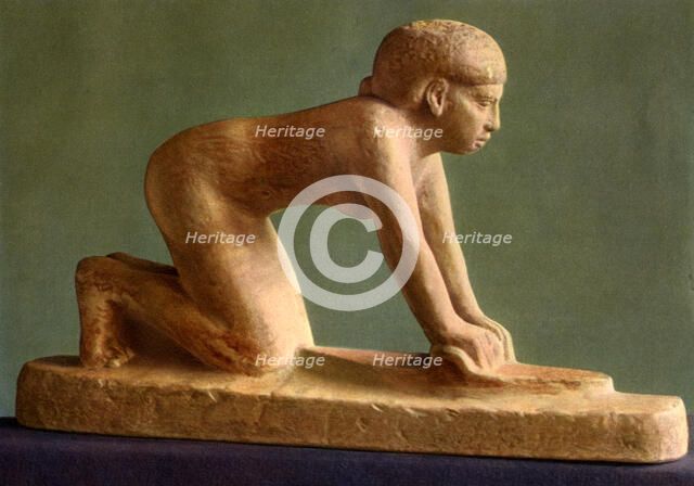 A woman grinding corn, c2650 BC (1936). Artist: Unknown