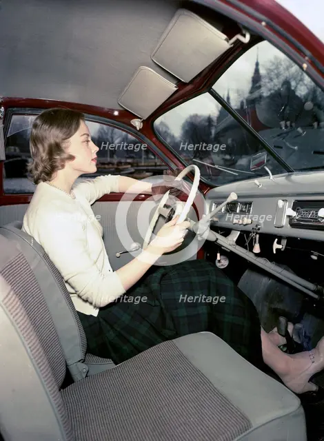 A woman in a Saab 92 car, Sweden, 1952-1953. Creator: Göran Algård.