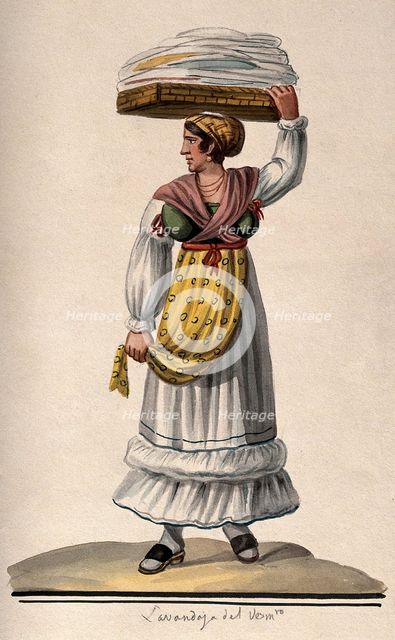A woman is holding a large flat basket of washing on her head. Creator: Unknown.