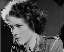 A Woman Operating a Radio, 1940. Creator: British Pathe Ltd