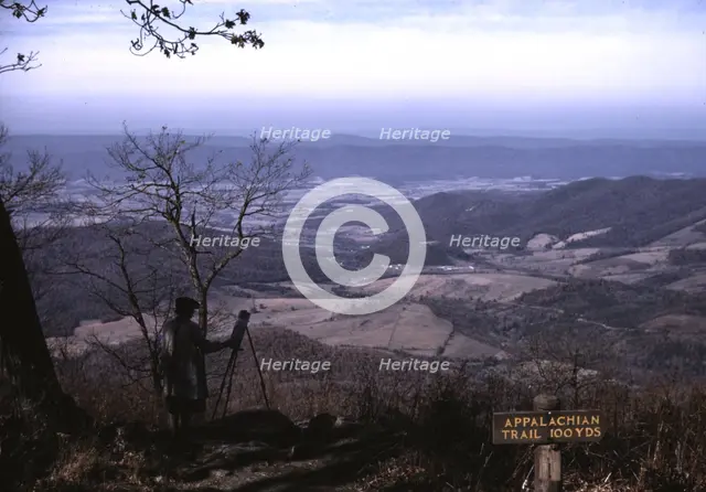 A woman painting a view of the Shenandoah Valley...entrance to the Appalachian Trail, Va, ca. 1940. Creator: Jack Delano.