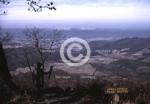 A woman painting a view of the Shenandoah Valley...entrance to the Appalachian Trail, Va, ca. 1940. Creator: Jack Delano.