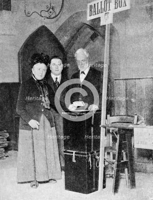 A woman recording her vote at the ballot box, c1922. Artist: Unknown