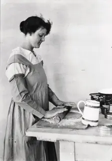 A woman rolls pastry, Rowntree’s factory, York, Yorkshire, 1920